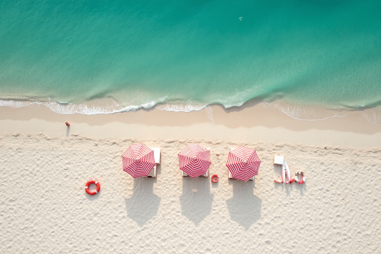 A group of umbrellas on a beach